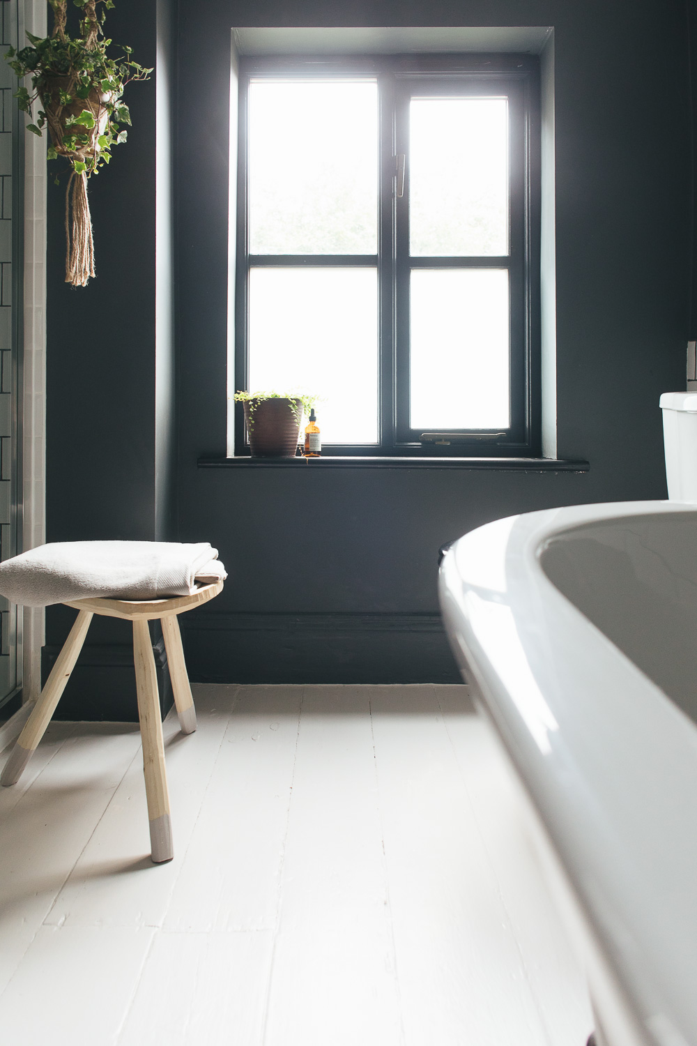 dark bathroom with natural neutral colour accents