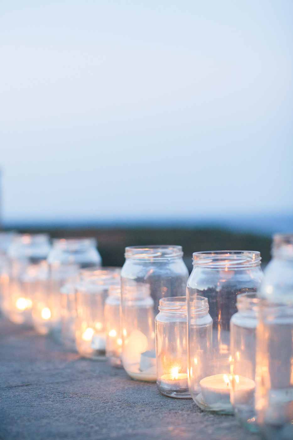 Jam jars filled with candles | Image by Cecelina Photography