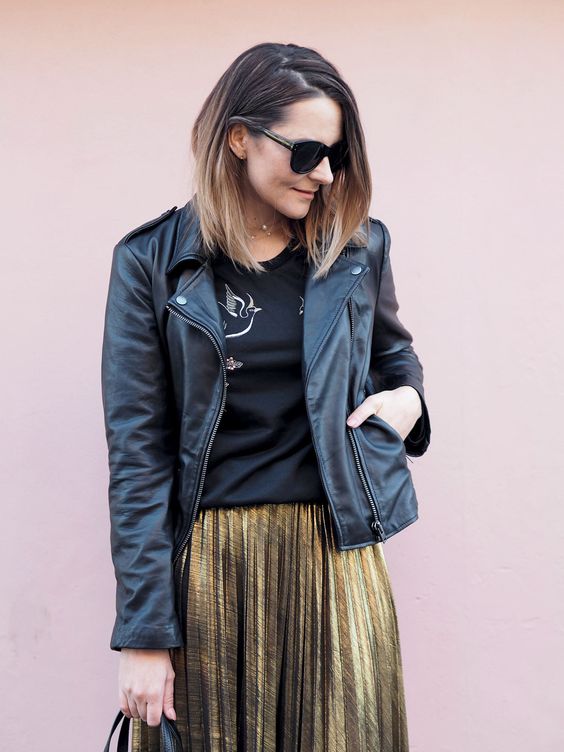 Biker and gold pleated skirt