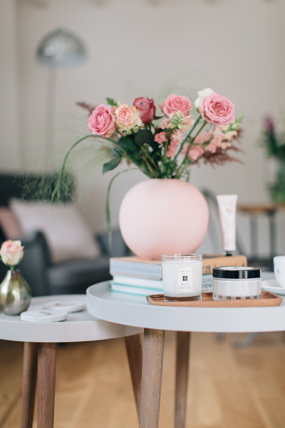 Blush accents and Jo Malone products on Cox & Cox side tables
