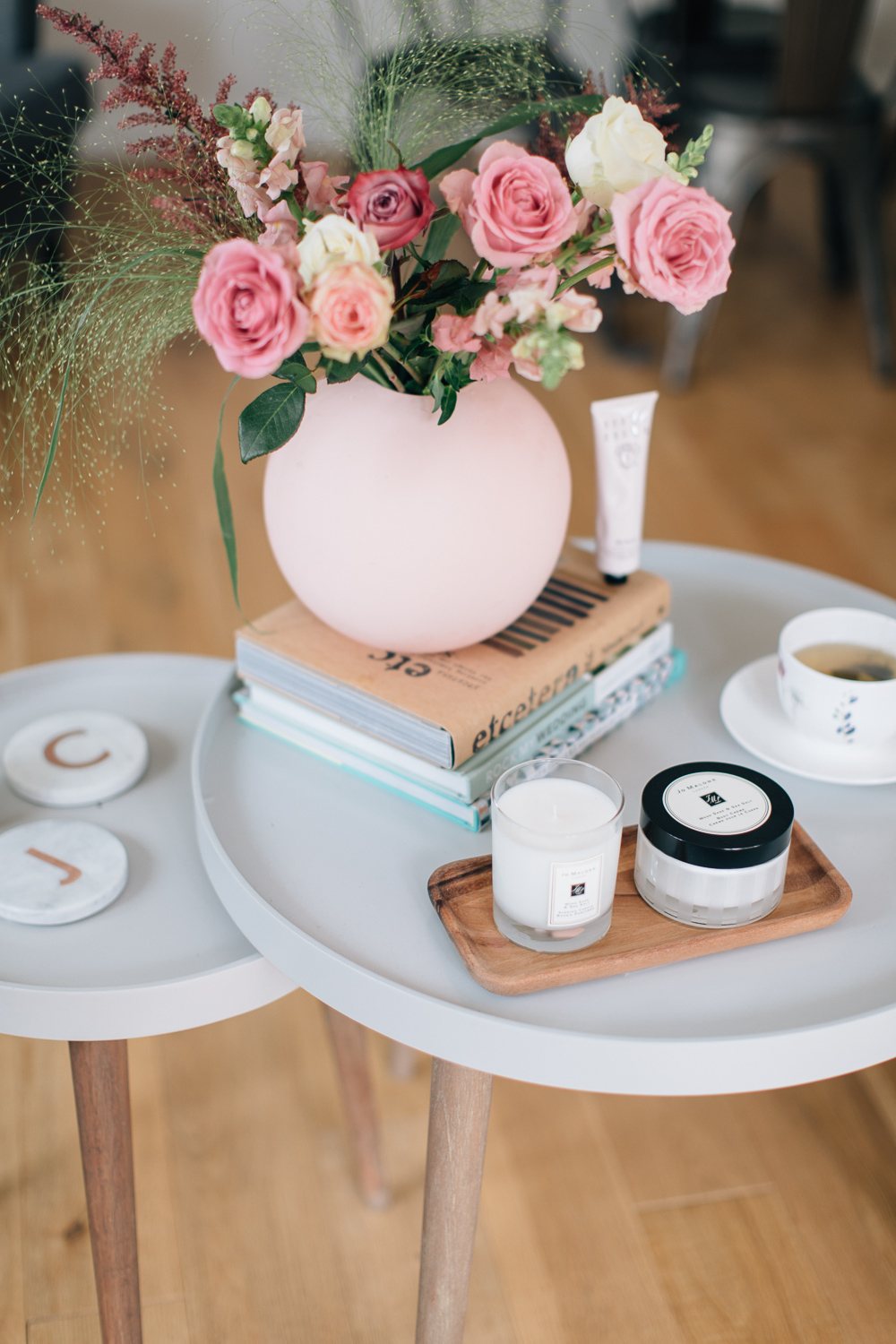Blush accents and Jo Malone products on Cox & Cox side tables