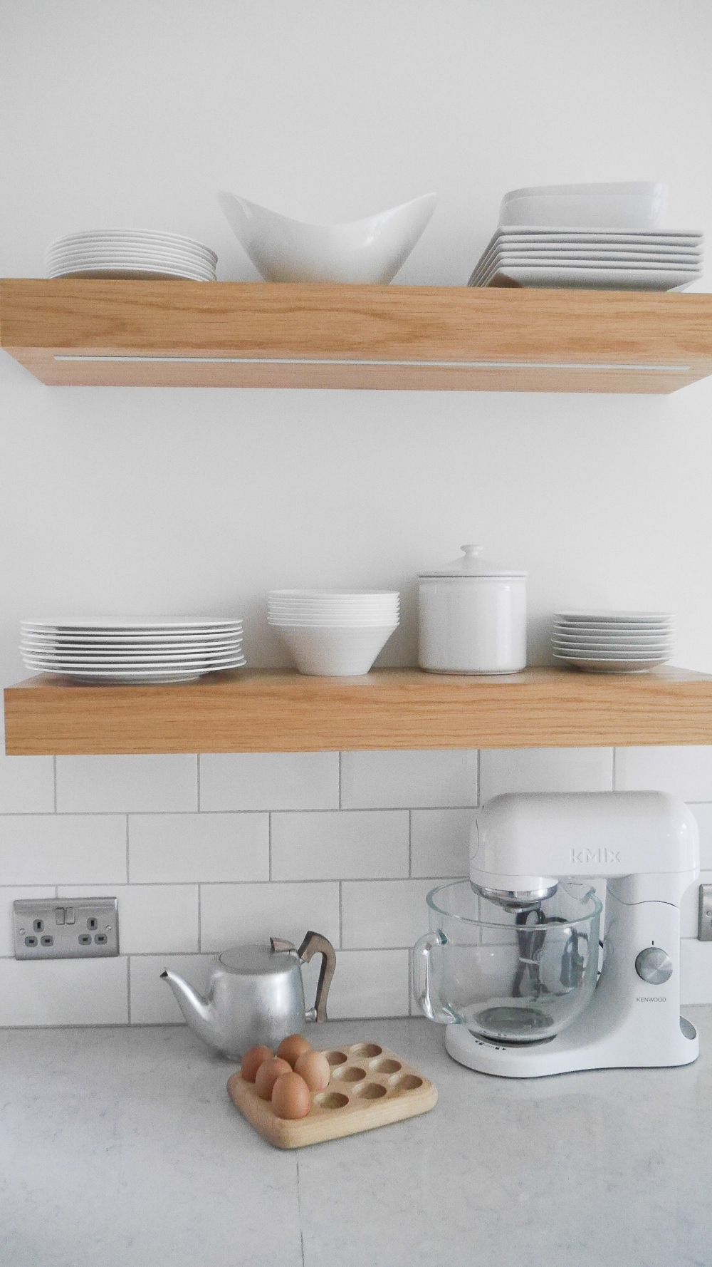 Claire's bright white kitchen and scandi-dining