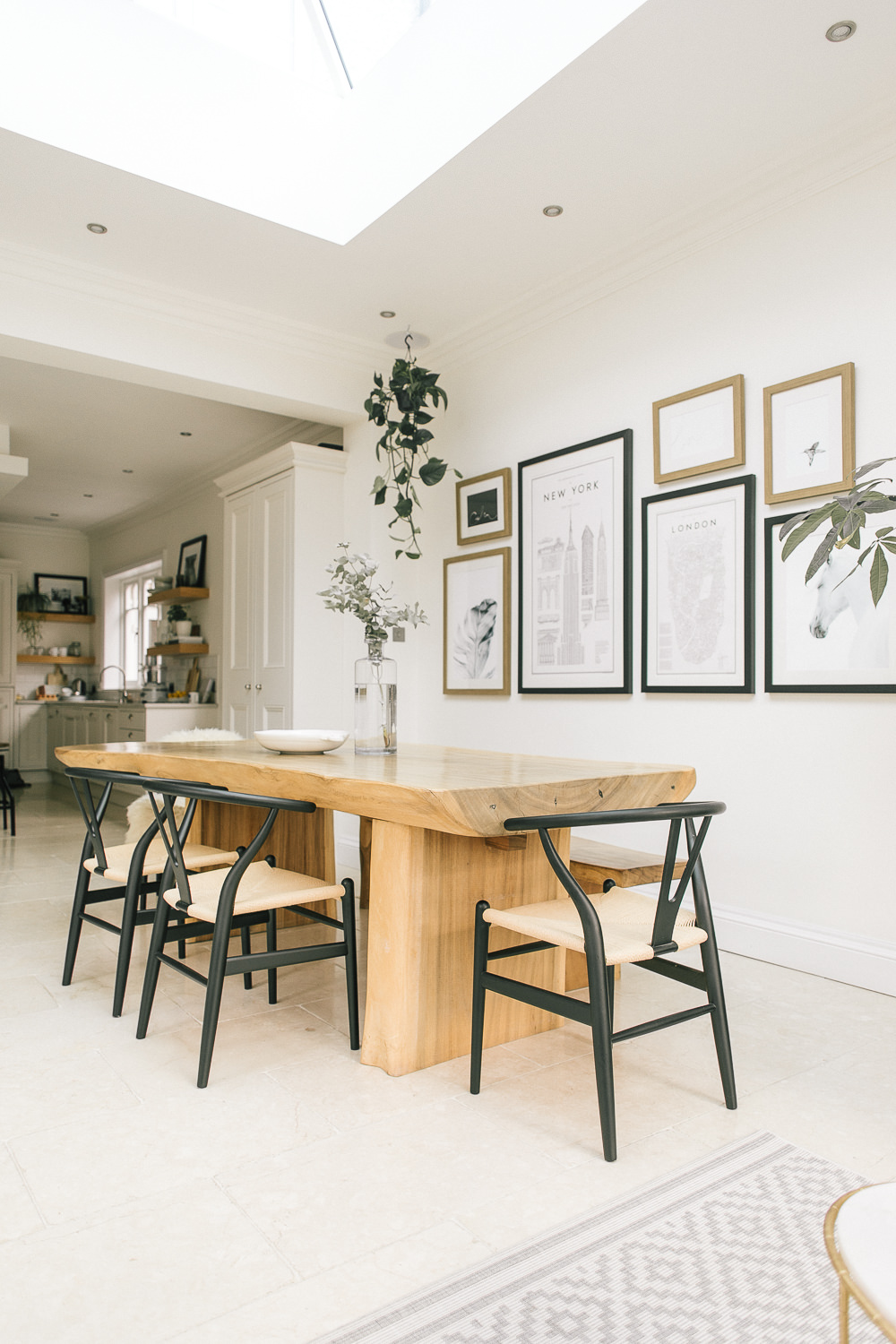 Gallery wall, wishbone chairs and Bali table