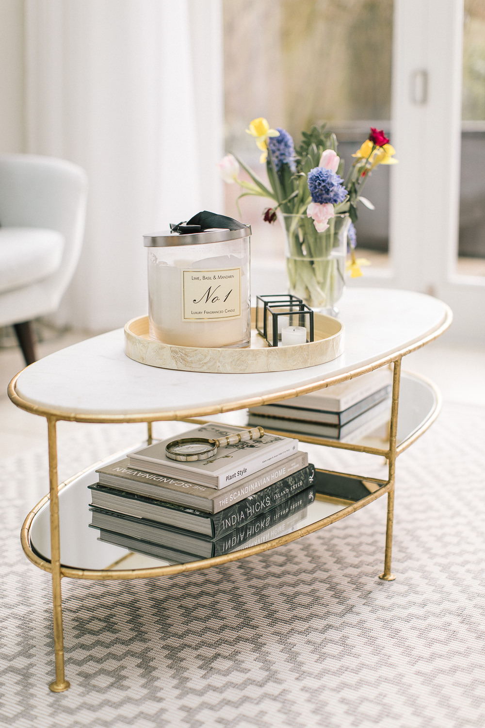Gold and white coffee table styling