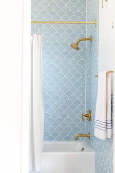 Light blue fishtail shower tiles