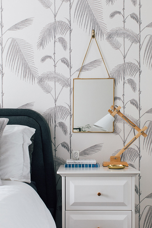 Palm Print Wallpaper in a grey and white bedroom