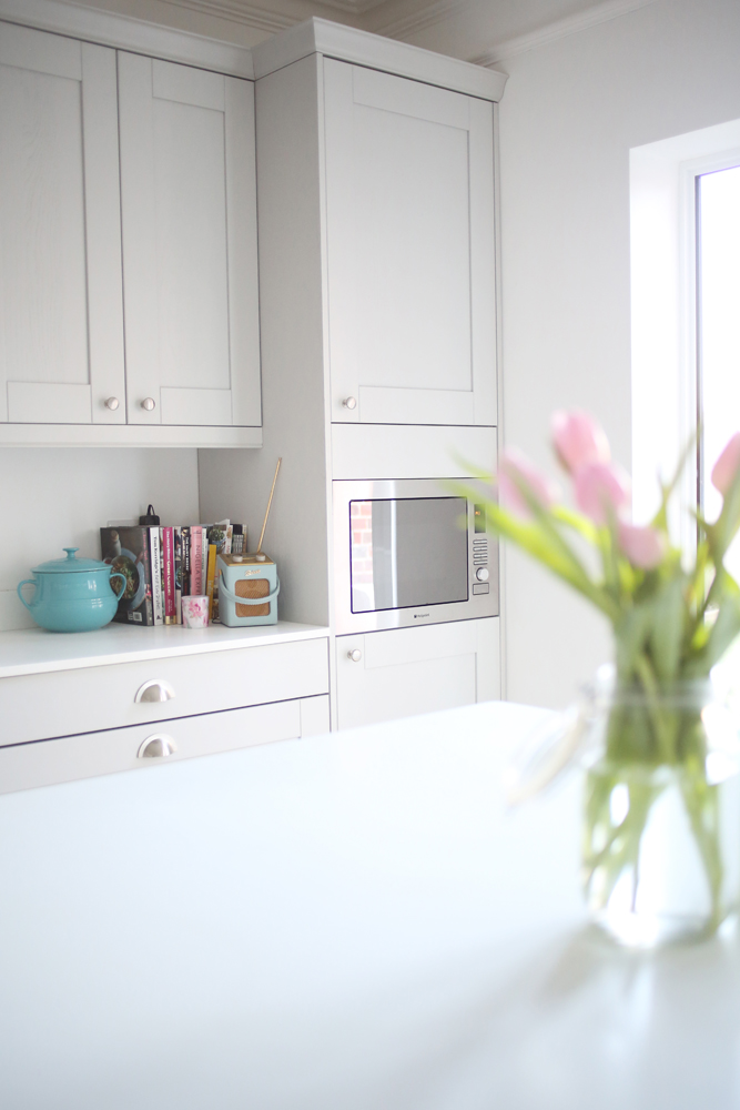 Pink tulips in a bespoke kitchen