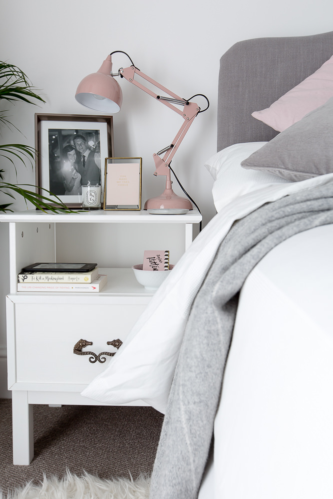Blush, grey and white bedroom with gold accents
