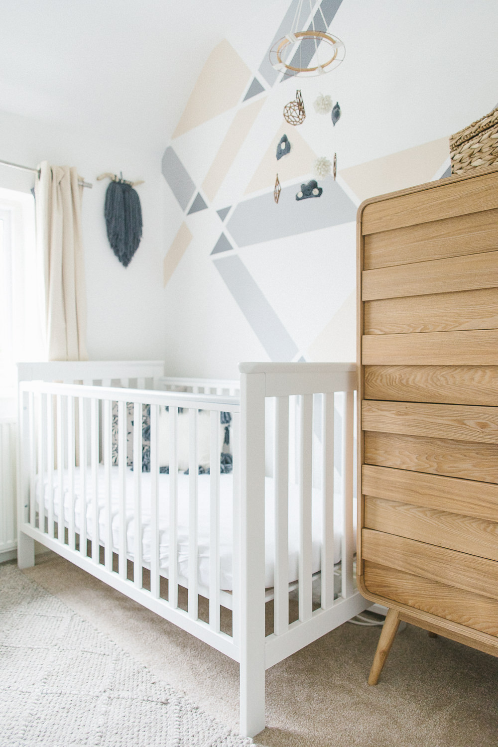 Classic unisex nursery in grey, white and wood