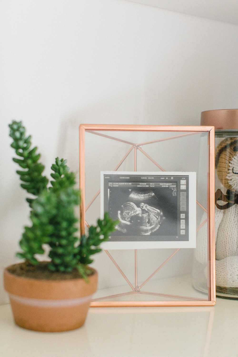 Baby scan photo in copper frame