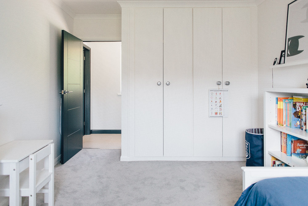 Built-in wardrobes and door painted in Farrow & Ball Down Pipe