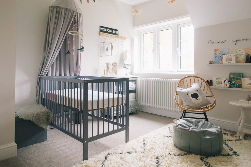 Mokee Stone Blue Mini Cotbed with Grey Canopy  in neutral nursery
