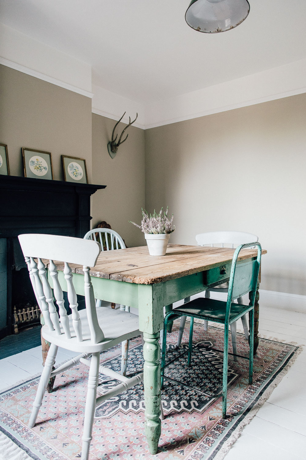 Vintage distressed table and antique chairs