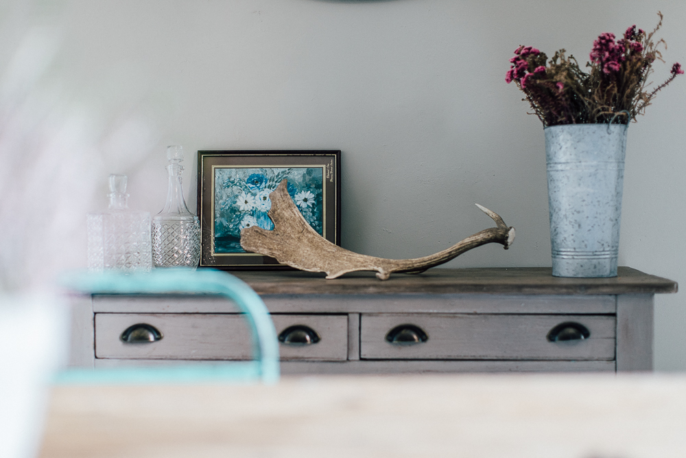 Vintage console table and antlers