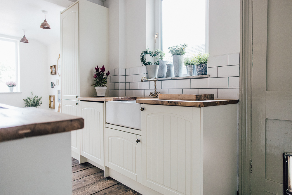 Neutral wickes kitchen with vintage details
