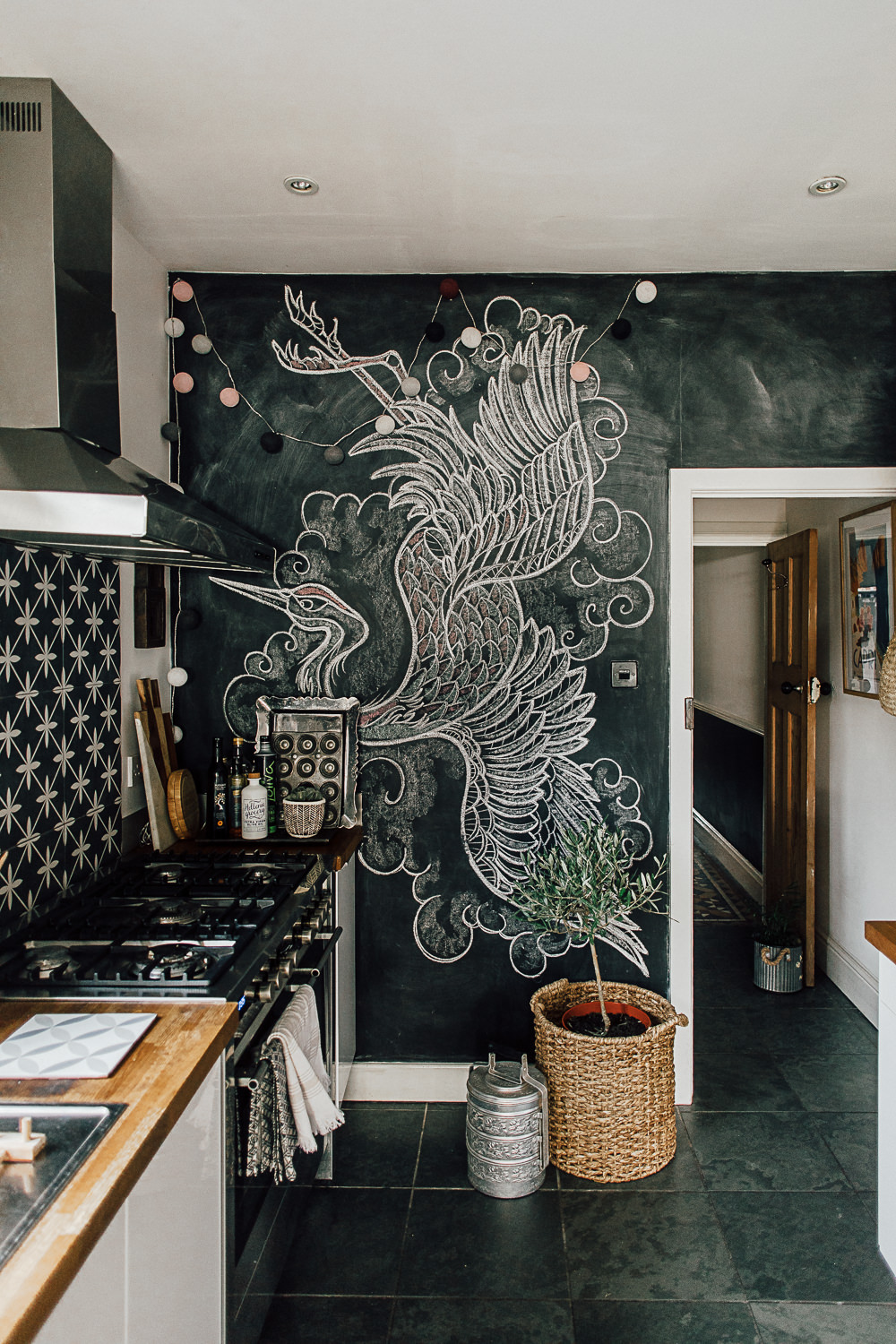 Blackboard paint on kitchen wall with hand drawn illustrations