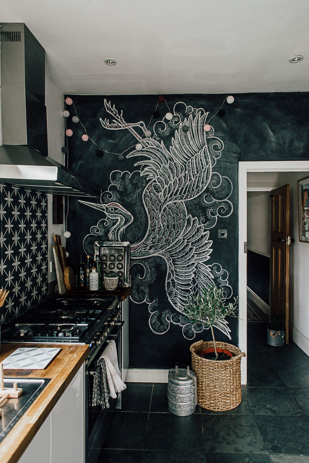 Blackboard paint on kitchen wall with hand drawn illustrations