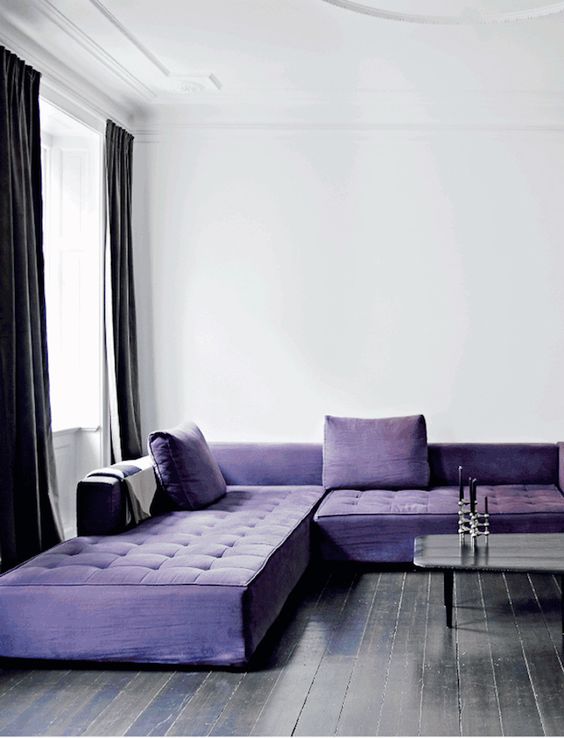 Modern minimalist living room with purple features