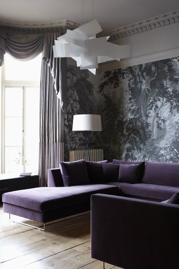 Ultra violet sofa and statement wallpaper