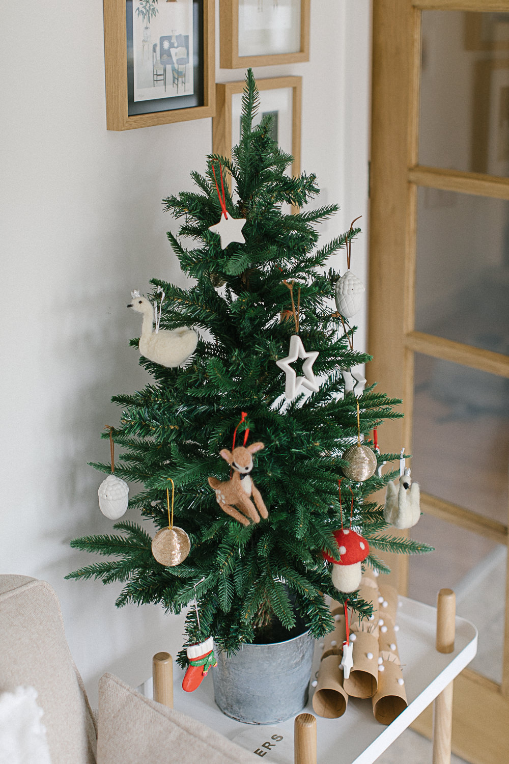 How to Make Your Own Festive Hanging Branch and Wreaths