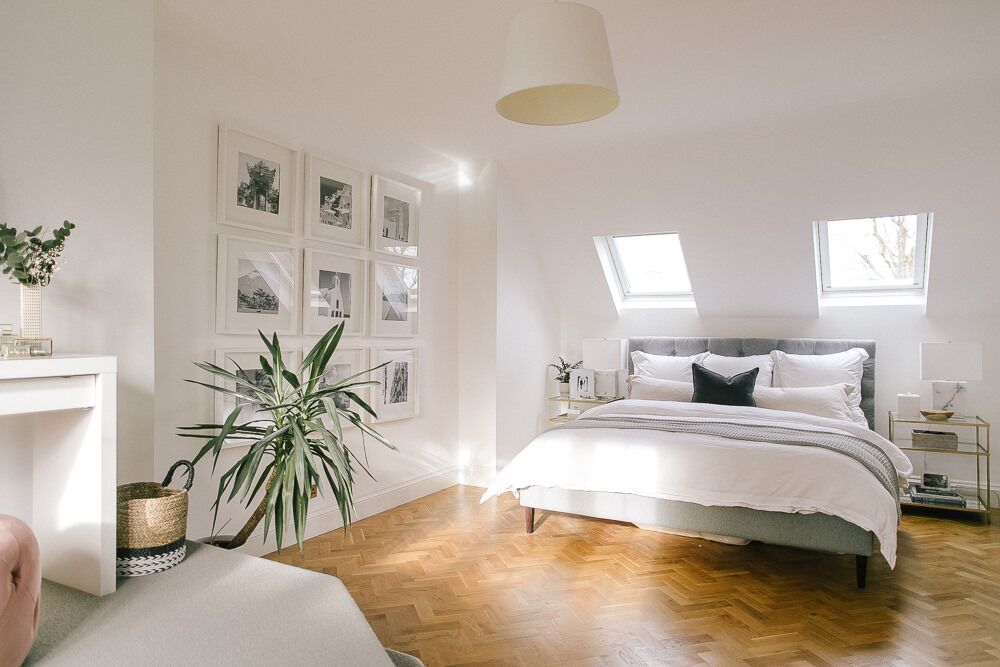 White and grey bedroom | Parquet floors | Gallery wall with Ikea frames